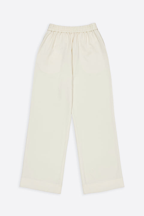 The light wool trousers have minimal modern aesthetics design allowing comfort and bringing self-confidence. This unique piece is made locally in Paris to reduce environmental impact and guarantee high quality and durability of the products.