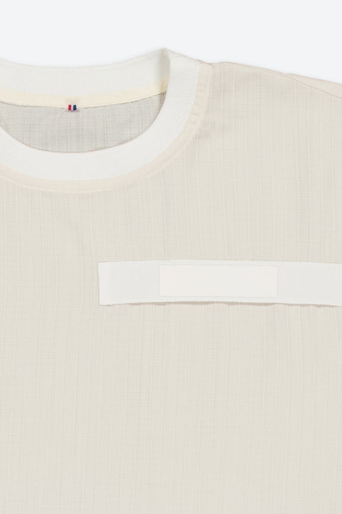 The light weight t-shirt has minimal modern aesthetics design allowing comfort and bringing self-confidence. This unique piece is made locally in Paris to reduce environmental impact and guarantee high quality and durability of the products.