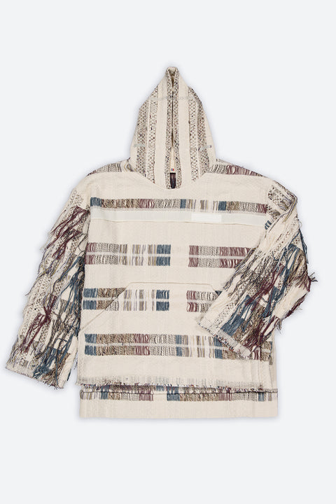 The artisanal fringe hoody is a mix of tweed fabrics from luxury houses deadstock. This unique piece is made locally in Paris to reduce environmental impact and guarantee high quality and durability of the products. It is gender neutral, has oversize fit and has a minimal impact on environment.
