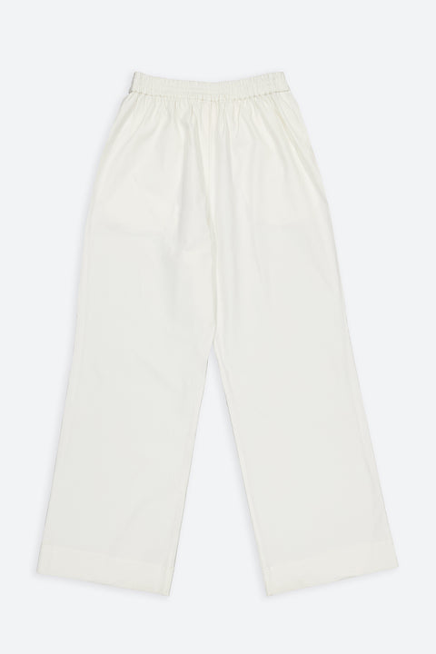 The white cotton stripes trousers have minimal modern aesthetics design allowing comfort and bringing self-confidence. This unique piece is made locally in Paris to reduce environmental impact and guarantee high quality and durability of the products.