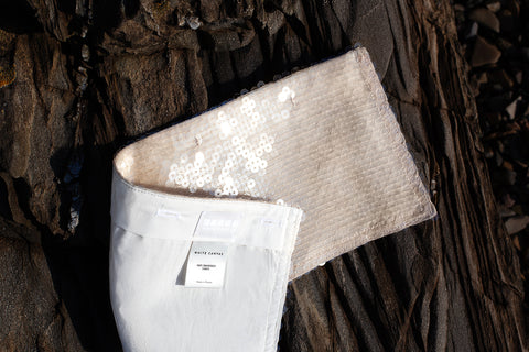 The sequins horizontal panel is an exclusive unique sustainable piece made in France. It is made to be attached to the essential pieces to personalize them and wear them your unique way.
