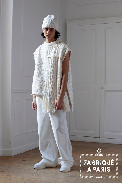 The artisanal sleeveless sweater is a mix of tweed fabrics from luxury houses deadstock. This unique piece is made locally in Paris to reduce environmental impact and guarantee high quality and durability of the products. It is gender neutral, has oversize fit and has a minimal impact on environment. 