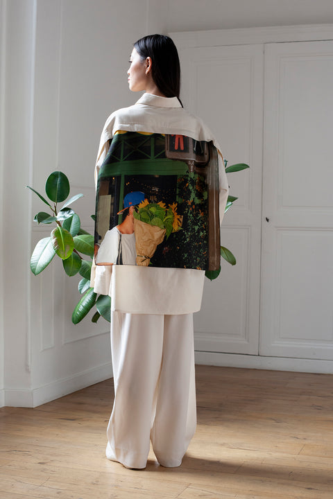 SiJia is wearing the White Canvas ESSENTIAL SHIRT styled with the Flower guy foulard and square panel made from a qualitative silk fabric. The foulard is printed in France with an exclusive photo by the photographer Henrique Soares. Wear the foulard alone or attach it to the essential pieces to personalize them and wear them your unique way. Your perfect summer accessory. White Canvas x Henrique Soares creative collaboration.