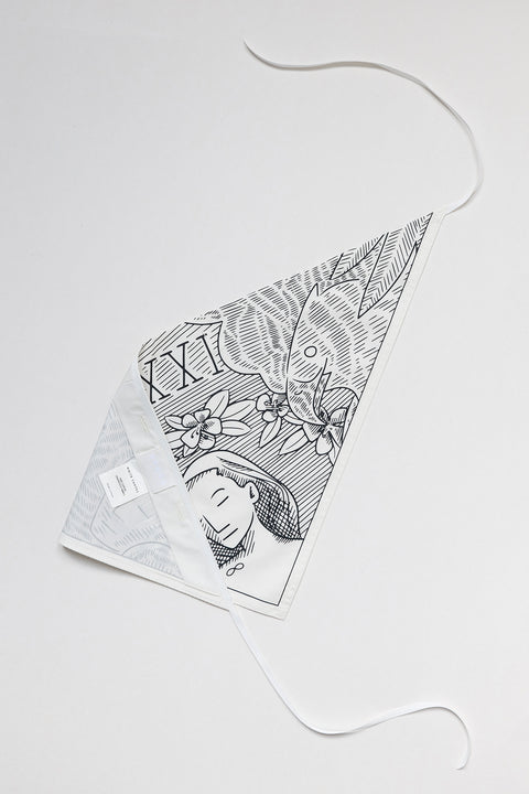 THE WORLD triangular panel & bandana is made from leftover deadstock white cotton poplin. The bandana has an exclusive design inspired by tarot cards drawn by the artist Maria Robla and printed with black artisanal eco-friendly ink locally in Paris in collaboration with RoStudio. Wear the black and white bandana alone or attach it to the essential pieces to personalize them and wear them your unique way. Your perfect summer accessory.